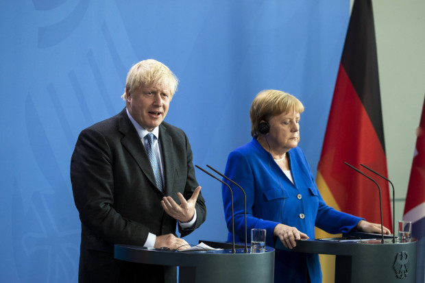 Angela, wir schaffen das! Eine Bildbeschreibung.