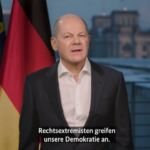 Olaf Scholz sieht sich von Rassisten umzingelt